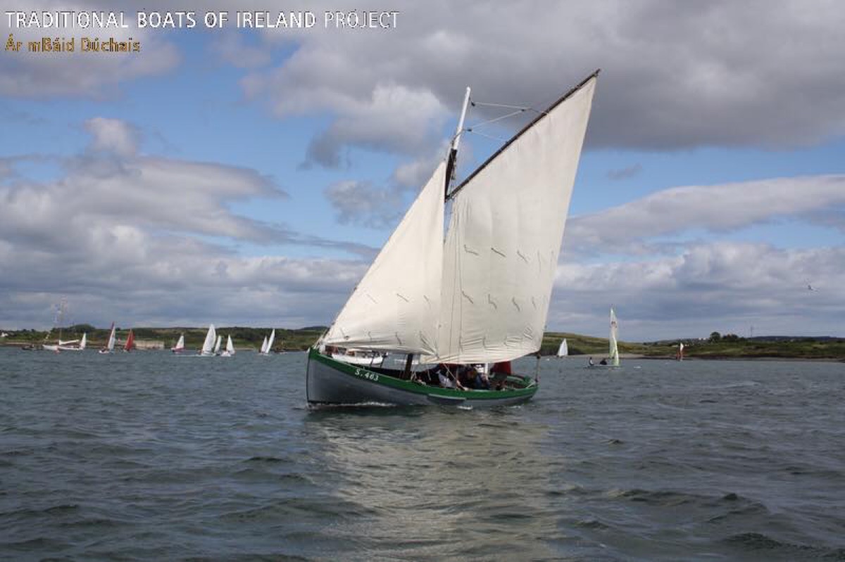 Traditional sailboat on the water