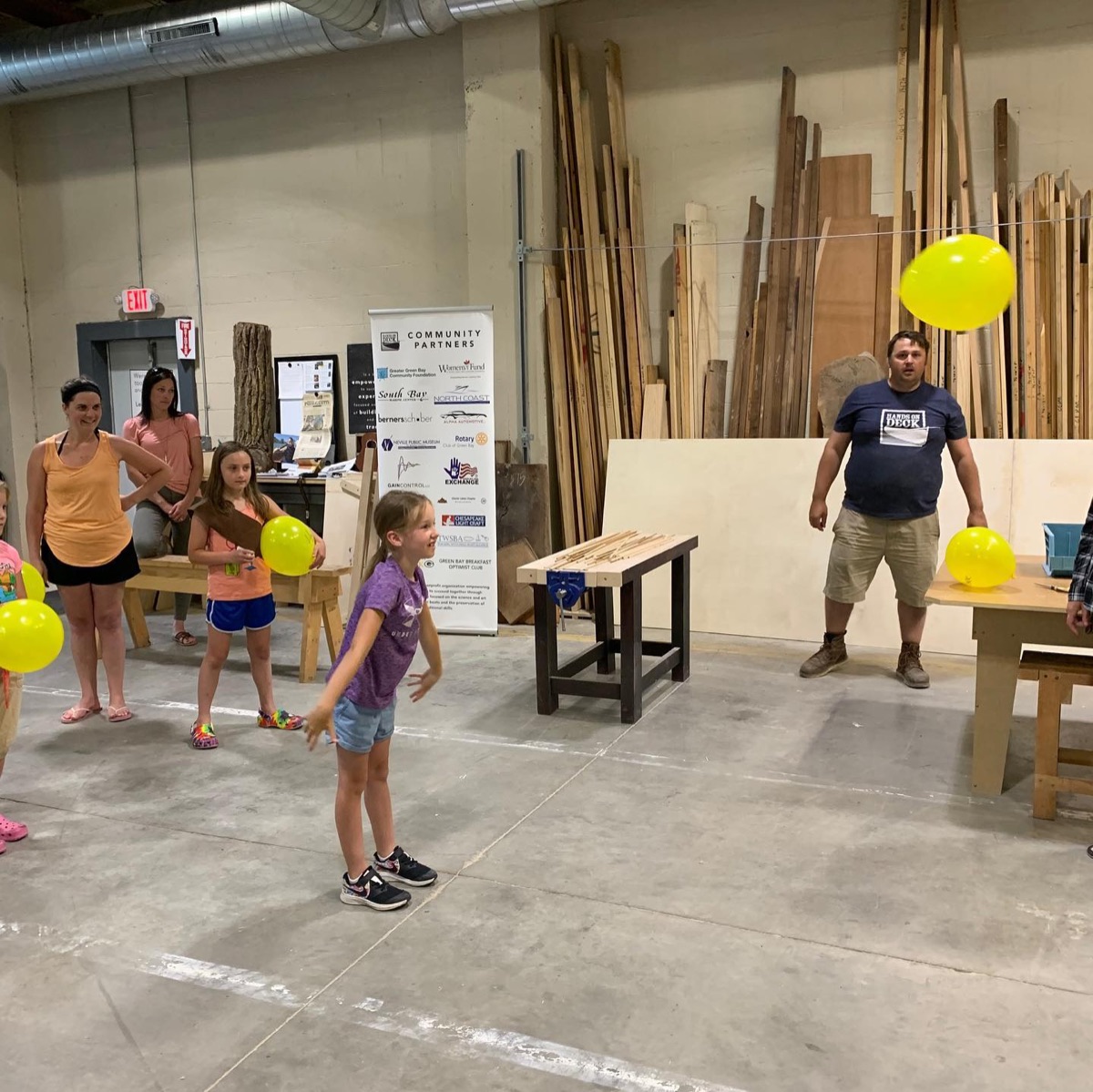 Children playing with balloons in the workshop